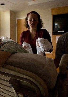 Using a rebozo to sift a client with an epidural